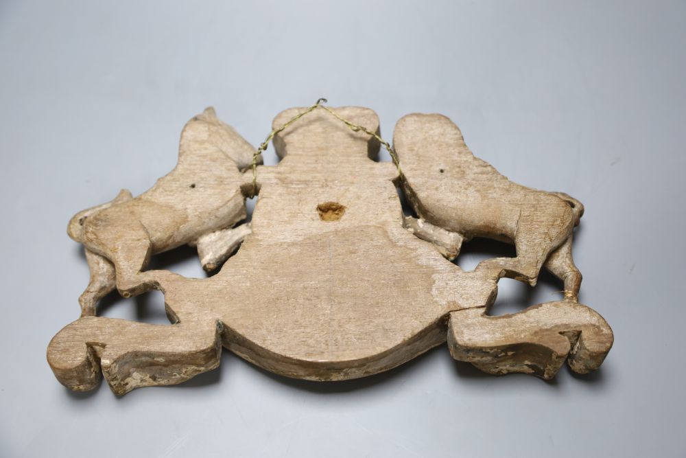 An 18th century carved limewood Royal coat of arms, width 30cm